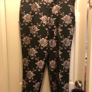 Black pants with purple floral jacquard print